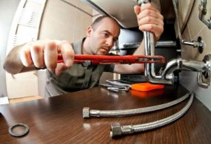 drain repair Tom, a Foster City drain cleaning pro, is working on fixing a kitchen drain