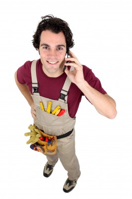 plumber on the phone Timm is on the phone talking with a client